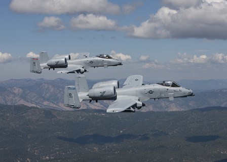 Two A-10 Thunderbolt&#39;s Fly over Mountains in Central Idaho by HIGH-G Productions/Stocktrek Images art print