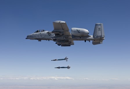 A-10C Thunderbolt Releases Two GBU-12 Laser Guided Bombs by HIGH-G Productions/Stocktrek Images art print
