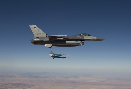 An F-16 Fighting Falcon Releases two GBU-12&#39;s by HIGH-G Productions/Stocktrek Images art print