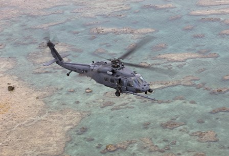 An HH-60G Pave Hawk Along the Coastline of Okinawa, Japan by HIGH-G Productions/Stocktrek Images art print