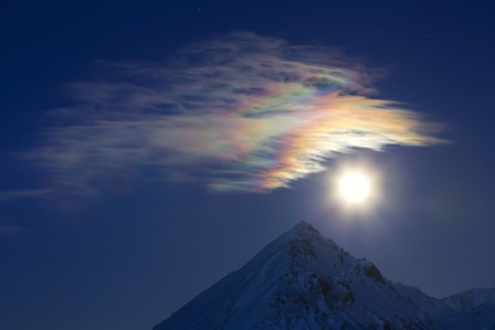 Full Moon with Rainbow Clouds at Ogilvie Mountains by Joseph Bradley/Stocktrek Images art print
