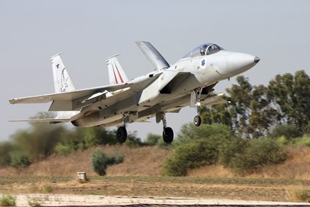 An F-15C Baz of the Israeli Air Force landing at Tel Nof Air Force Base by Ofer Zidon/Stocktrek Images art print