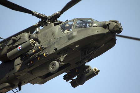 An AH-64 Apache in Flight by Terry Moore/Stocktrek Images art print