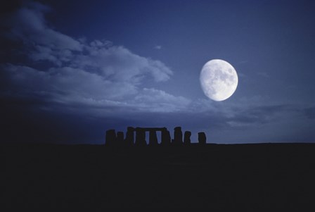 Composite of the Moon over Stonehenge, Wiltshire, England by Stocktrek Images art print