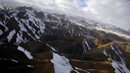 Aerial view over Mountains in Afghanistan by Stocktrek Images art print