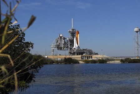 Space Shuttle Discovery on the Launch Pad by Stocktrek Images art print