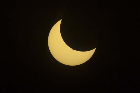 Partial Eclipse of the Sun as seen from Jasper, Alberta, Canada by Alan Dyer/Stocktrek Images art print
